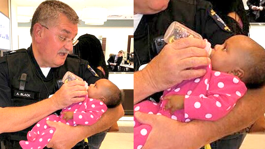 Police Officer Feed Baby After Helping Mom